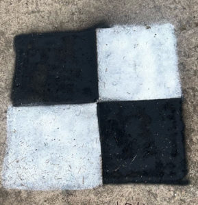 Black and White Checker Marker on pavement